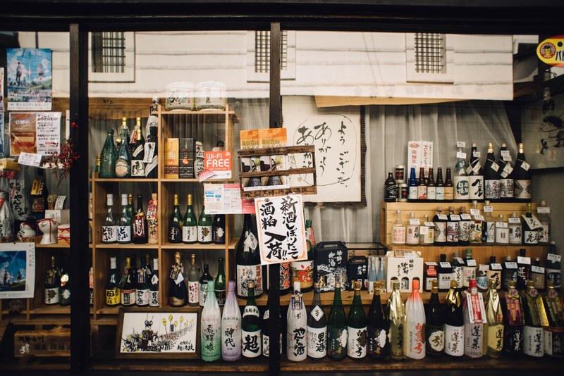 the inside of an oriental store with various types of alcohol, oriental alcohol store 4k
