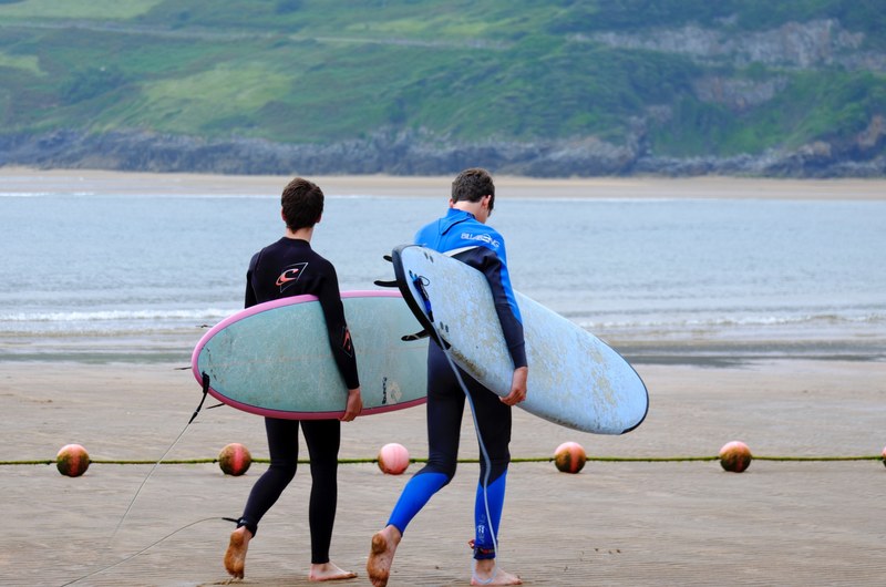 surfer surfboard beach and sand 4k