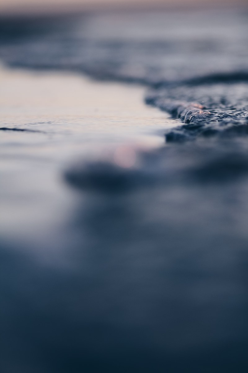 ocean foam on the sand tahunanui beach, a new favourite 4k