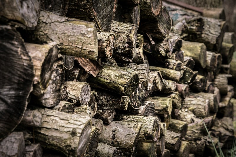 logs of old lumber wood stacked together, logged up 4k