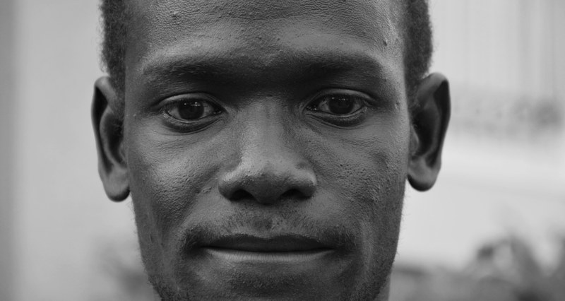 black and white close up shot of mans face in rome, idris 4k