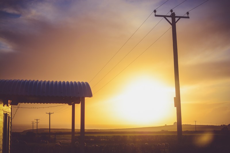 shed pylon powerline and telephone line 4k