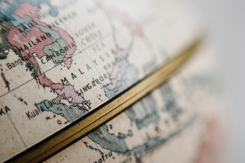 a close up of a golden rim running across a globe, golden equator 4k