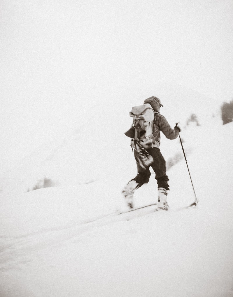 cross country skiing through a snowy hillside in la sal mountains, storm hike 4k