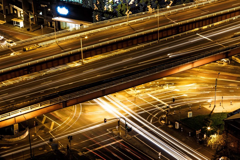 long exposure of traffic going over and under a bridge in southbank at night, southbank traffic at night 4k