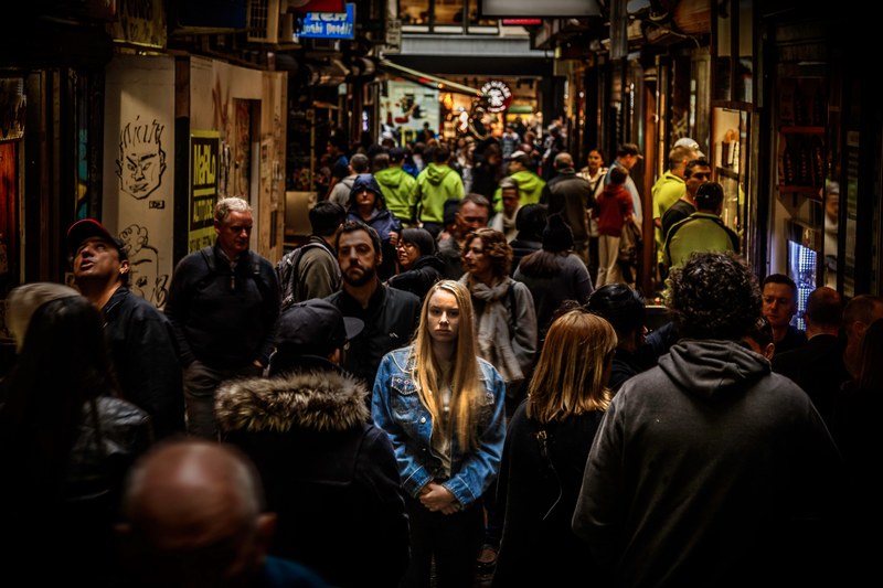 a crowd of people in a narrow street in melbourne, urban crowd 4k