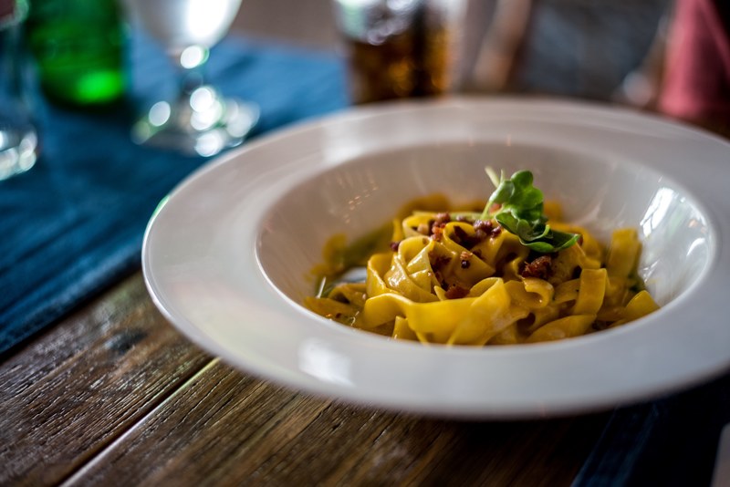 fresh bowl of pasta ragu in an italian restaurant, the temptress 4k