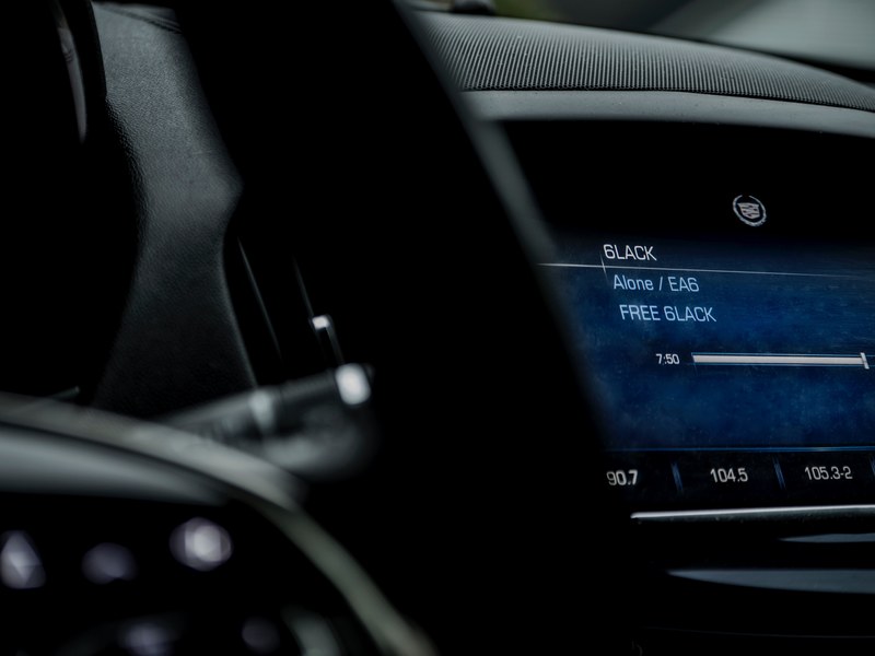 macro of cadillac car dashboard and screen with communication technology, macro cadillac car dashboard 4k