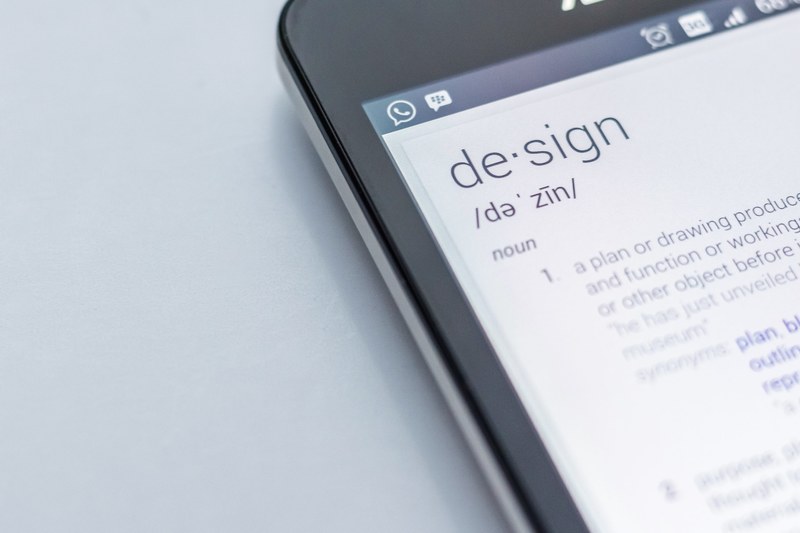 the dictionary definition of the word design displayed on a smartphone screen, design smartphone definition 4k