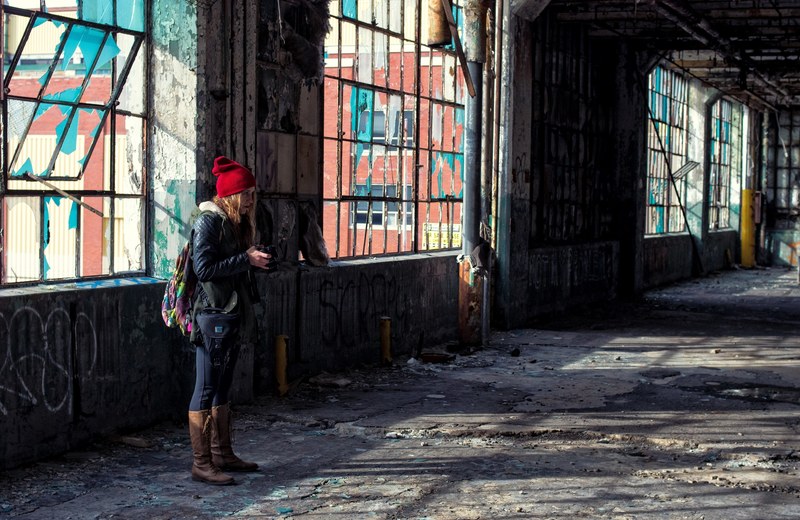 women standing in an old urban detroit building, old detroit building 4k