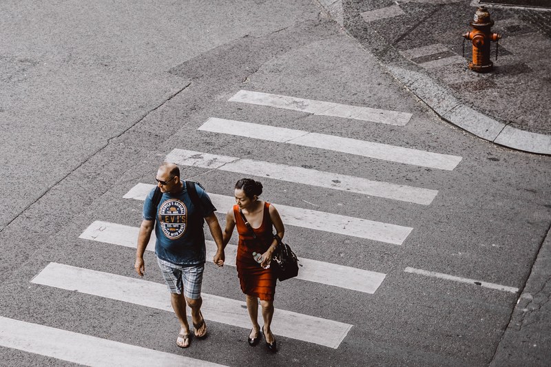 crossing walking couple and zebra crossing 4k