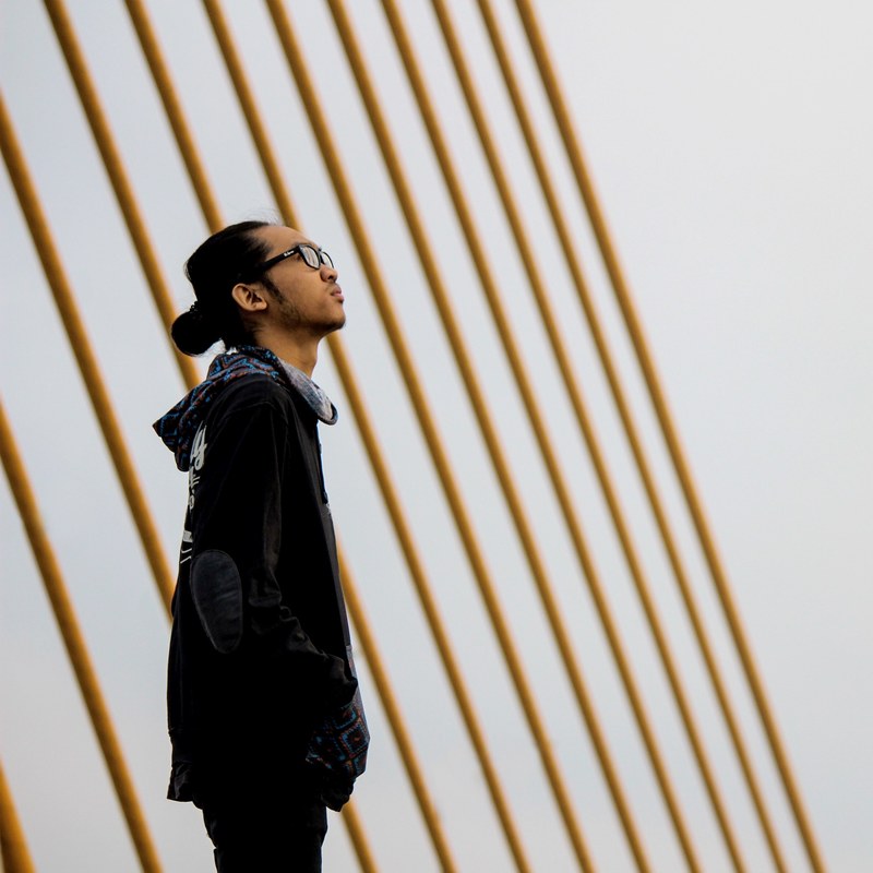 trendy hipster man with a man bun looking up, straight line 4k