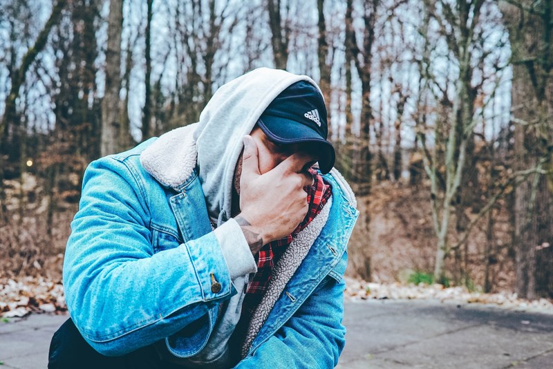 a man in a hoodie and a cap covering his face, 3am 4k