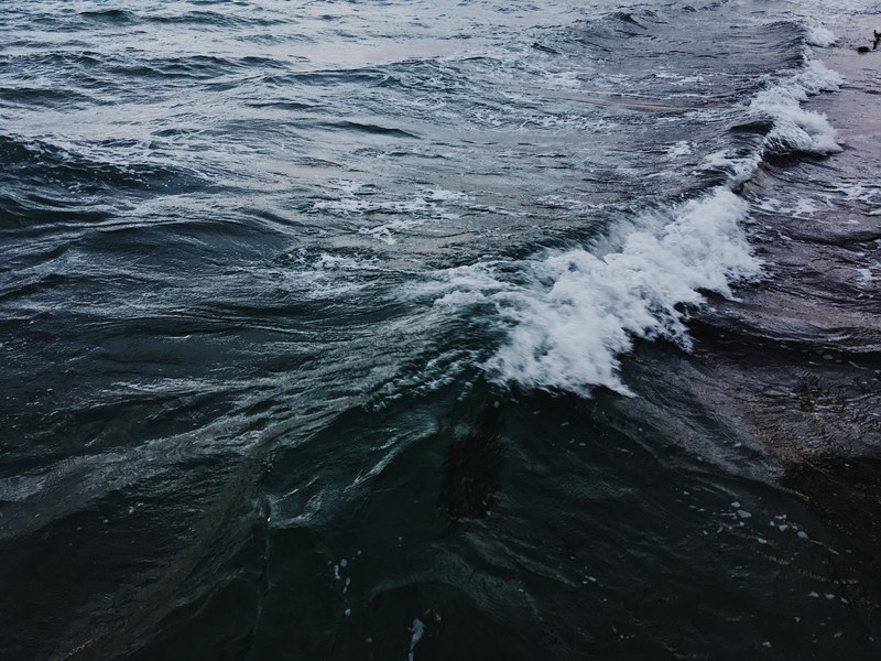 waves during a rare storm on island 4k