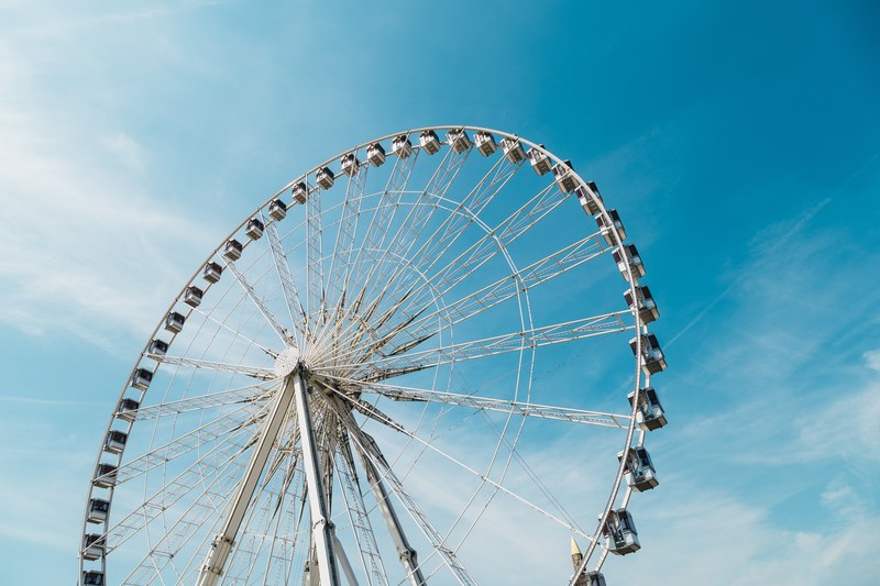 a large ferris wheel against a blue sky in paris, ferris wheel in paris france by tranmautritam 4k