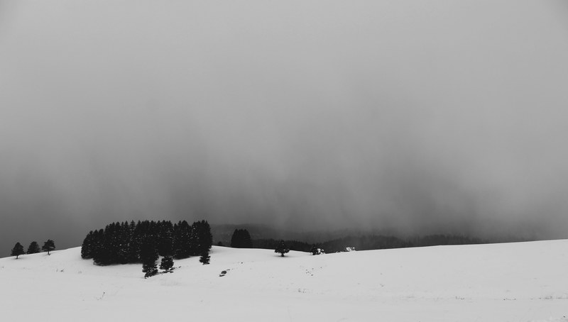a black and white photo of mountains and snow covered fields in new mexico, winter mountains in new mexico 4k