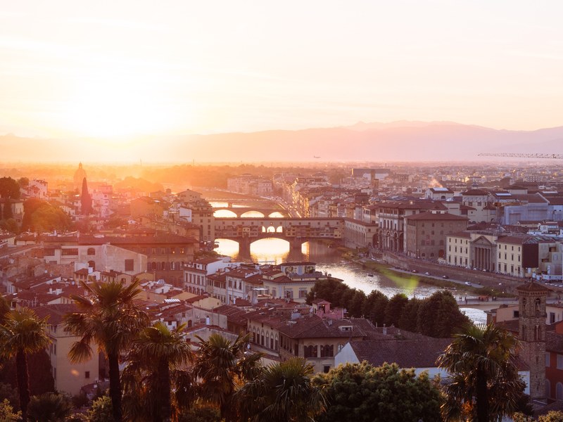 the sun sets over the bridges of the river arno in the city of florence tuscany italy, tuscan sunset over florence 4k