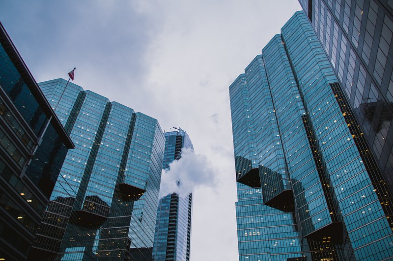 wide glass facades of modern office buildings in toronto, vaper in da house 4k