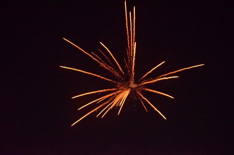 firework lights spark and orange 4k