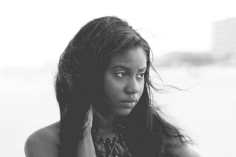 black and white photograph of a woman posing at daytona beach, photograph of woman posing 4k