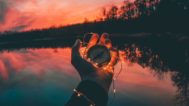 compass, hands, sunset, light, 4k