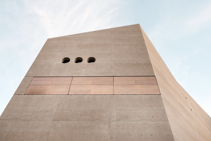 a large concrete slab of the swiss national museum building, concrete slab architecture 4k