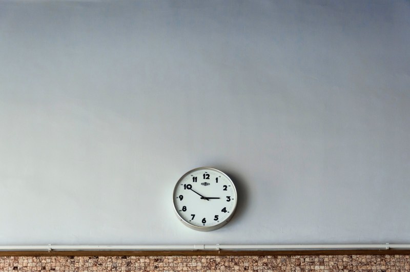 a round analog clock on a white wall, round analog clock 4k
