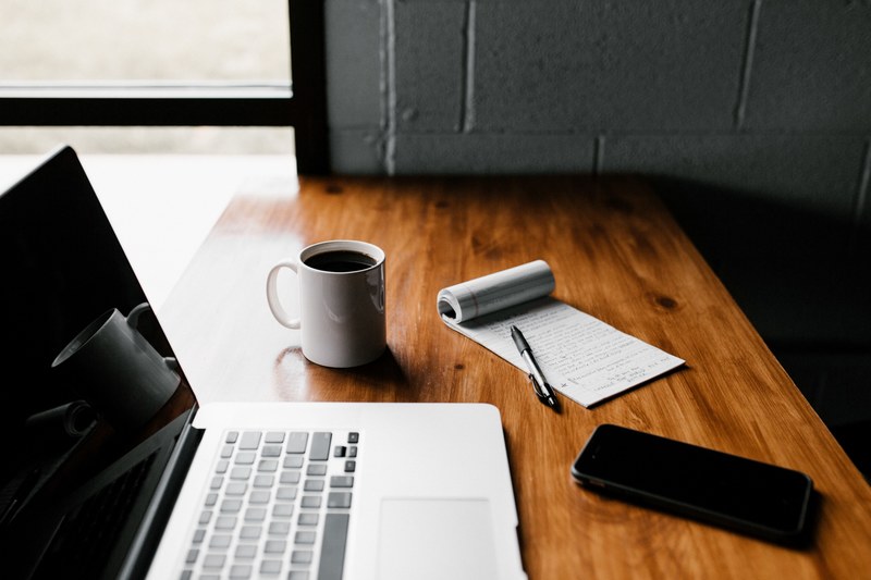 a flatlay with a laptop a notepad a smartphone and a mug of coffee, hard work 4k