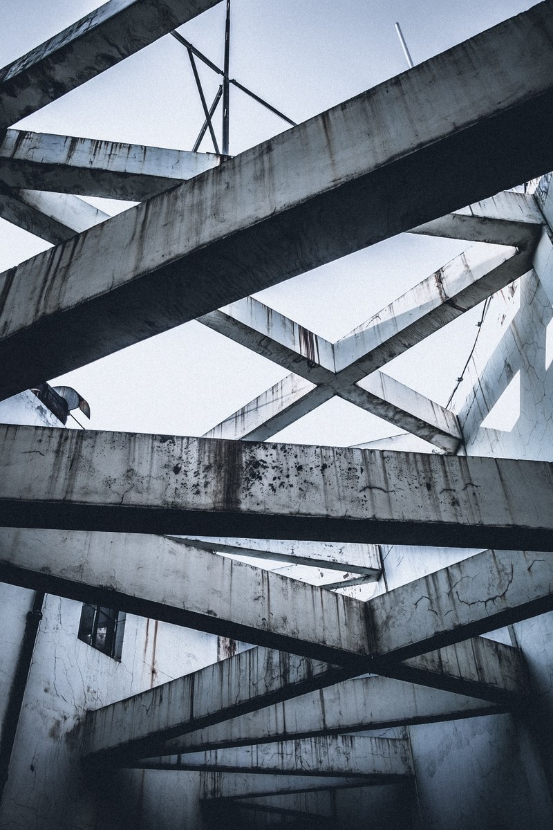 concrete cruciform ribbing in an old abandoned building, concrete ruins 4k