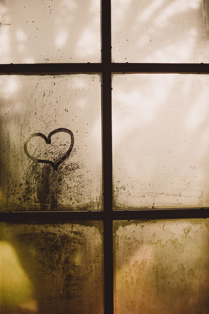 someone has traced a heart with their finger onto this foggy window, foggy window heart 4k
