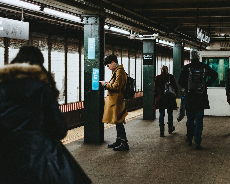 commuters wait at the subway platform for their trait to work, time is an illusion 4k