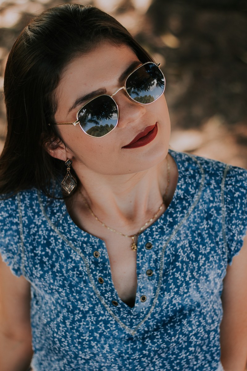 a portrait of a woman in sunglasses and crimson lipstick looking at the camera, woman in crimson lipstick 4k