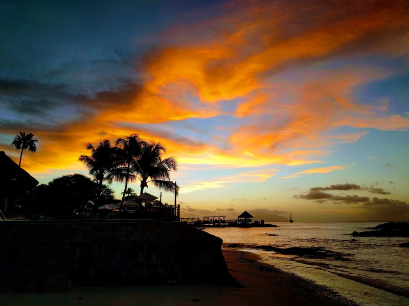 sunlit clouds during sunset at the bel ombre beach seychelles, sunset in paradise 4k