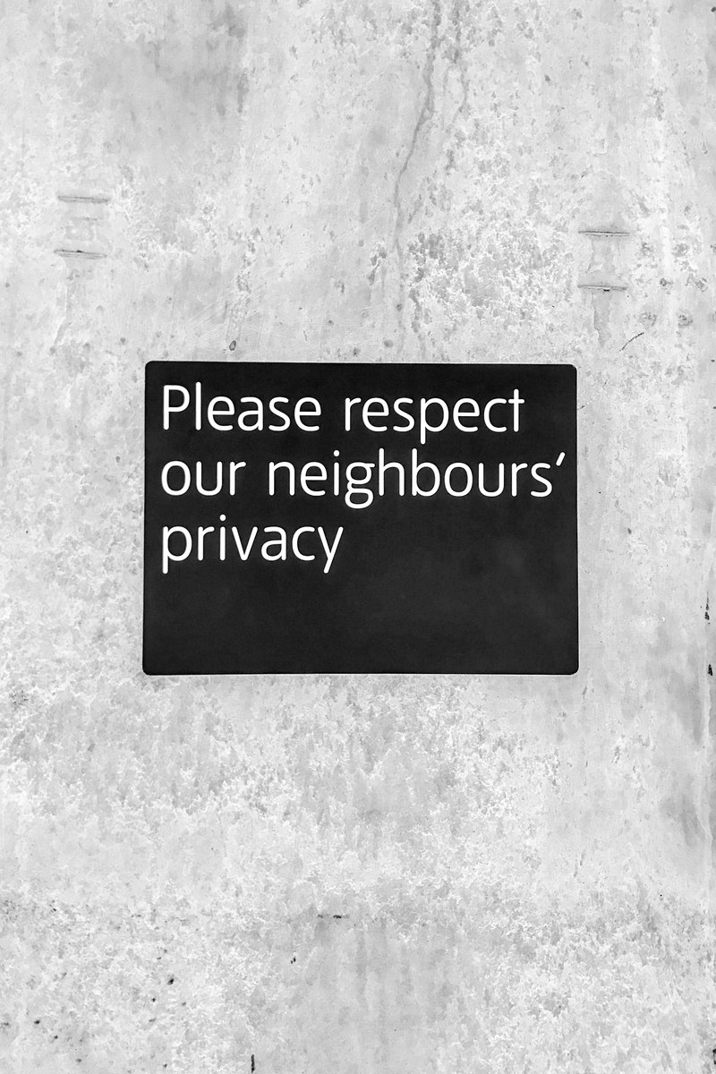 a black sign with white text on a wall that reads quotplease respect our neighbors privacyquot, _black sign white text 4k