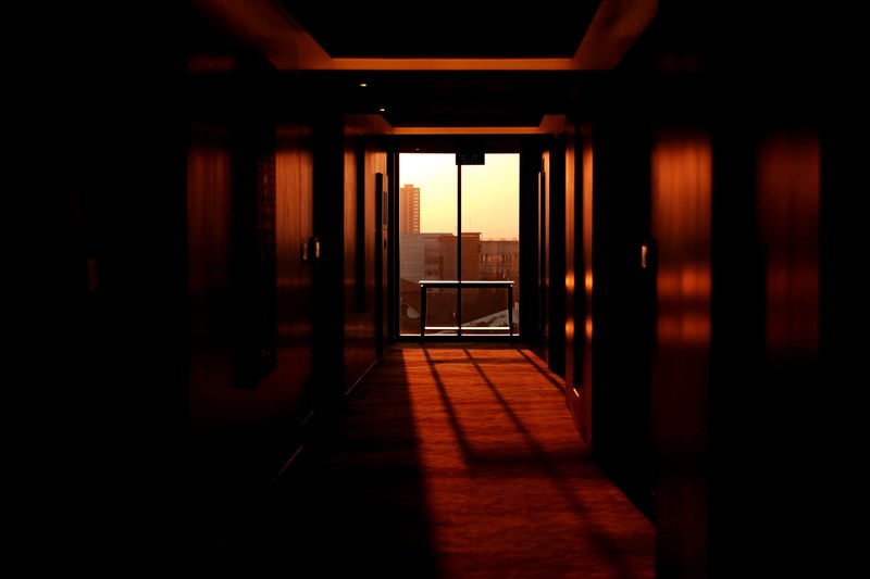 lights coming through the windows of a hotel 4k