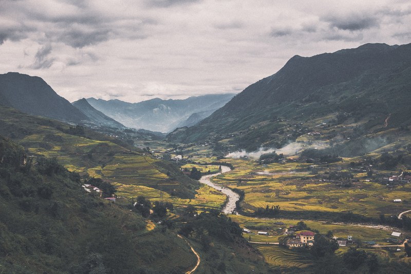 a magnificent mountain village on a small river in vietnam, vietnamese mountain village 4k