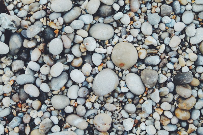various size pebbles at the beach in tretat, various size beach pebbles 4k