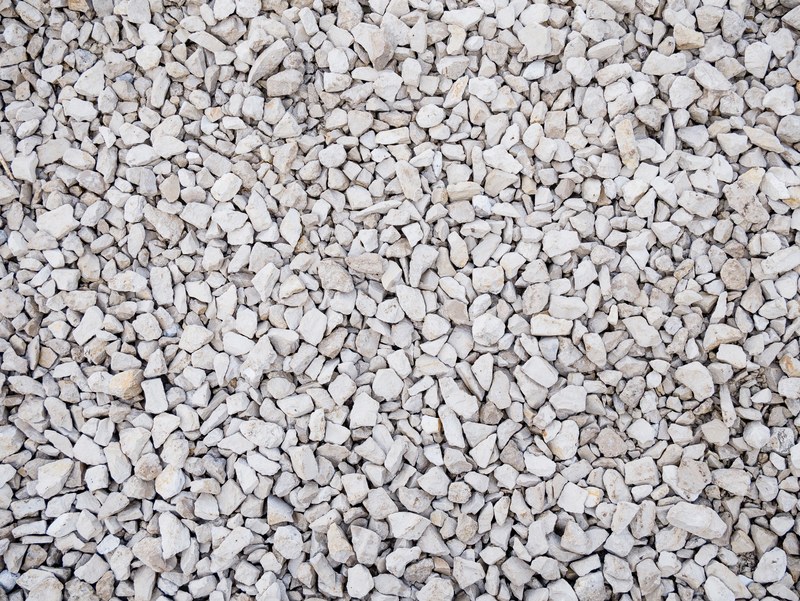 white stones and rocks cover the ground, stones 4k