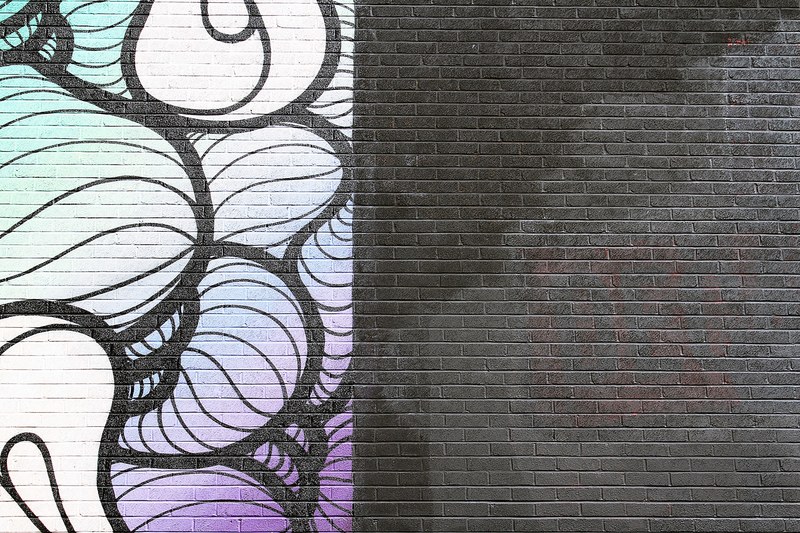london wall painted half black with abstract mural on left half, shoreditch 4k