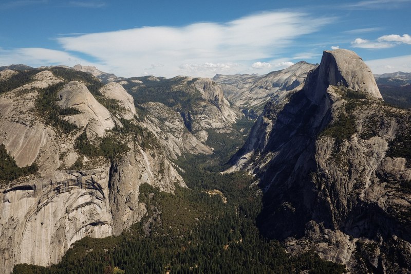 a high view of rock faces in the yosemite valley, scenic view of yosemite valley 4k