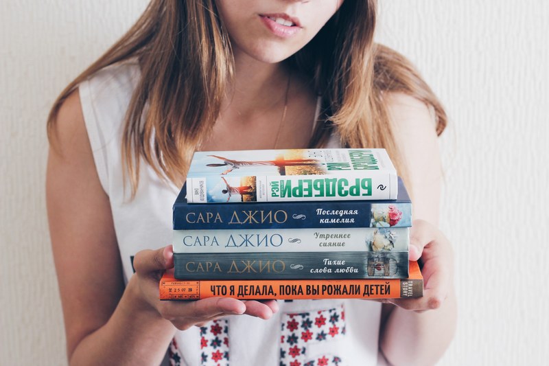 book hand holding and woman 4k