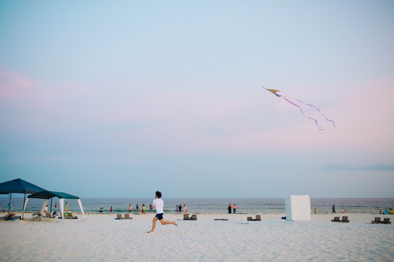 happy summer seaside activity and flying kite at the beach, kite and exciting beach 4k