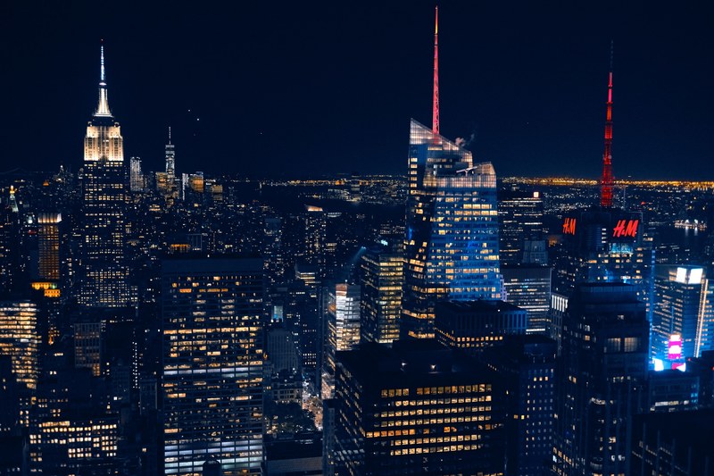 the new york city skyline and skyscraper lights in the dead of night, city of lights 4k