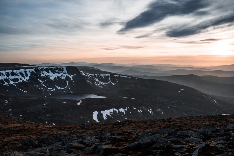 clouds swept across sky with sunset and snowy mountains in distance at lochnagar, lochnagar 4k