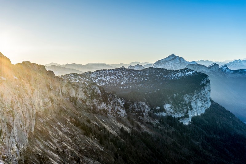 sun beams over a snowy mountain ridge in le parmelan, sunrise over le parmelan 4k