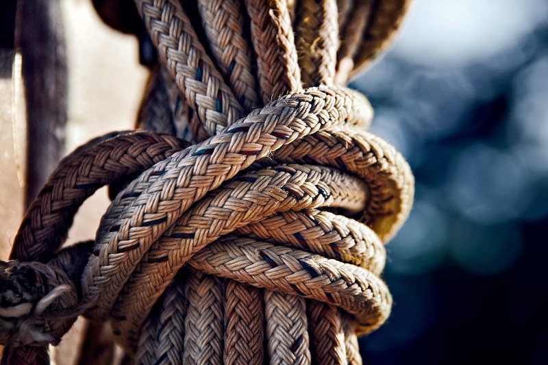 close up of a knot in a thick rope, thick rope knot 4k