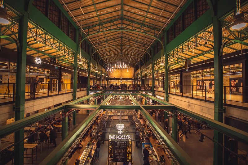 the interior of a market hall in warsaw, polish market hall 4k