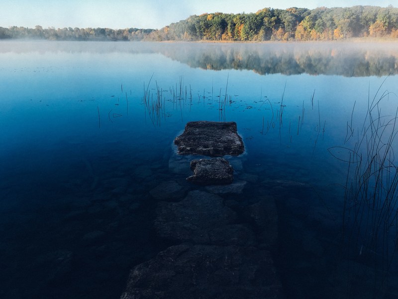 lake stone rock and reflection 4k