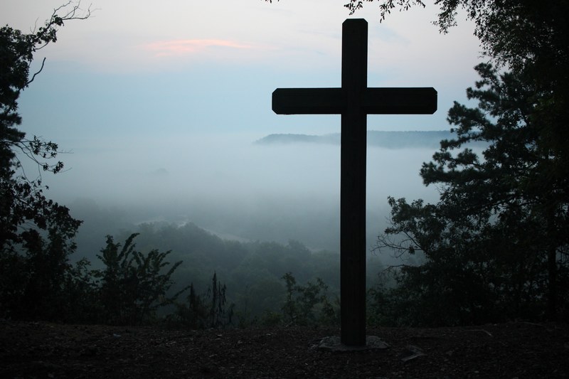 silhouette of christian cross near foggy mountain lookout in egan camp amp retreat center, cross through the clouds 4k
