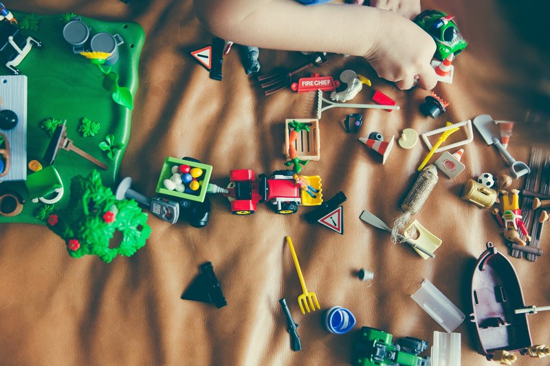a little boy playing with a lego set in erlangen, erlangen lego set 4k